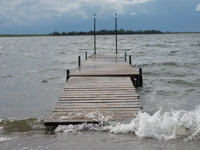 Dock at the lake with rising water